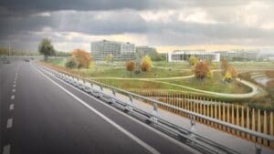 picture taken from car driving dow the highway with a green landscape in the background